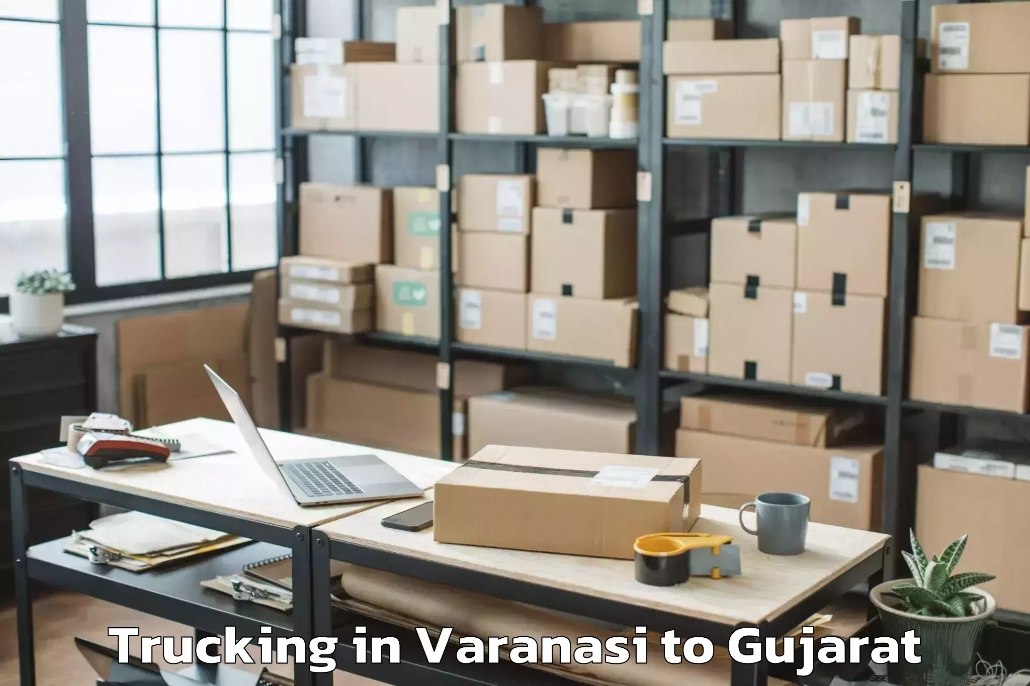 Book Varanasi to Ganpat University Mehsana Trucking Online